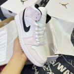 Air Jordan 1 Mid ‘Barely Rose’ Hồng